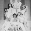 Director/choreographer Tommy Tune (C) hugging actor Cameron Johann with actresses (L-R) Louise Eideken, Shelly Burch, Taina Elg, Liliane Montevecchi, Anita Morris and unidentified others on the set of the Broadway production of the musical "Nine".