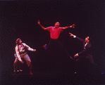 Director/playwright George C. Wolfe (C) flying through the air as actors Savion Glover (L) and Gregory Hines (R) react during a rehearsal for the Broadway production of the musical "Jelly's Last Jam.".