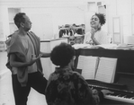 Director/playwright George C. Wolfe (L) working with an unidentified actress and accompanist during a rehearsal for the Broadway production of the musical "Jelly's Last Jam.".