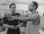 Director/playwright George C. Wolfe (R) working with Gregory Hines during a rehearsal for the Broadway production of the musical "Jelly's Last Jam.".