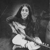 Composer Elizabeth Swados playing guitar on the set of the Broadway production of the musical "Runaways.".