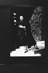 Director Geoffrey Holder wearing a black cape on the set of the Broadway production of the musical "The Wiz.".