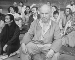 Director Peter Brook surrounded by his cast on the set of the BAM production of the play "The Mahabharata.".