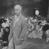 Director Peter Brook surrounded by his cast on the set of the BAM production of the play "The Mahabharata.".