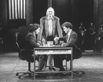 Lyricist Tim Rice (C) with actors Philip Casnoff (L) and David Carroll (R) on the set of the Broadway production of the musical "Chess.".