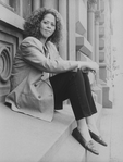 Actress/playwright Anna Deavere Smith sitting outside the Joseph Papp Public Theatre.