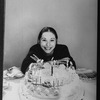 Playwright Beth Henley and a birthday cake.
