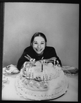 Playwright Beth Henley and a birthday cake.