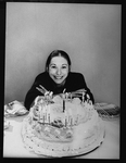 Playwright Beth Henley and a birthday cake.