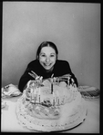 Playwright Beth Henley and a birthday cake.