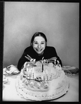 Playwright Beth Henley and a birthday cake.