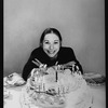 Playwright Beth Henley and a birthday cake.