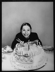 Playwright Beth Henley and a birthday cake.