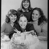 Playwright Beth Henley (C) with actresses (L-R) Mia Dillon, Mary Beth Hurt, Lizbeth Mackay and a birthday cake; from the Broadway production of the play "Crimes Of The Heart.".