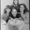 Playwright Beth Henley (C) with actresses (L-R) Mia Dillon, Mary Beth Hurt, Lizbeth Mackay and a birthday cake; from the Broadway production of the play "Crimes Of The Heart.".