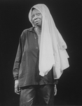 Actress Whoopi Goldberg wearing a shirt on her head in a scene from the Broadway production of her one-woman show "Whoopi Goldberg.".