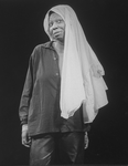 Actress Whoopi Goldberg wearing a shirt on her head in a scene from the Broadway production of her one-woman show "Whoopi Goldberg.".