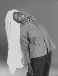 Actress Whoopi Goldberg wearing a shirt on her head in a scene from the Broadway production of her one-woman show "Whoopi Goldberg.".