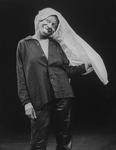Actress Whoopi Goldberg wearing a shirt on her head in a scene from the Broadway production of her one-woman show "Whoopi Goldberg.".