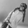 Actress Whoopi Goldberg wearing sunglasses and grabbing her crotch in a scene from the Broadway production of her one-woman show "Whoopi Goldberg.".