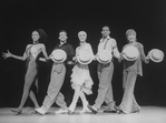 Entertainer Shirley MacLaine (R) with unidentified dancers in a number from the show "Shirley MacLaine On Broadway.".