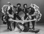 Entertainer Shirley MacLaine (C) with unidentified dancers in a number from the show "Shirley MacLaine On Broadway.".