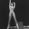 Actress Liza Minnelli in a sequin-covered pants outfit while performing a number from the Broadway production of the musical "The Act"