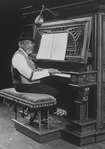 Musical director Luther Henderson at the onstage piano during the Broadway production of the musical "Ain't Misbehavin'.".