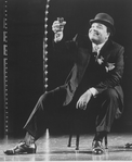 Actor Ken Page making a toast in a scene from the Broadway revival of the musical "Ain't Misbehavin'.".