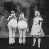 Actress Kate Burton as Alice with Tweedledum and Tweedledum in a scene from the Broadway revival of the play "Alice In Wonderland.".