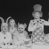 (L-R) Josh Clark as the March Hare, Kate Burton as Alice, Nicholas Martin as Dormouse and MacIntyre Dixon as the Mad Hatter in a scene from the Broadway revival of the play "Alice In Wonderland.".