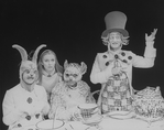 (L-R) Josh Clark as the March Hare, Kate Burton as Alice, Nicholas Martin as Dormouse and MacIntyre Dixon as the Mad Hatter in a scene from the Broadway revival of the play "Alice In Wonderland.".