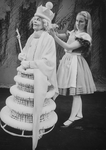 (L-R) Actresses Eva Le Gallienne (as the White Queen) and Kate Burton as Alice in a scene from the Broadway revival of the play "Alice In Wonderland.".