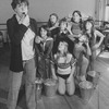 Actress Dorothy Loudon blowing a whistle as she is surrounded by orphan girls incl. Andrea McArdle (2L) as Little Orphan Annie during a rehearsal for the Broadway production of the musical "Annie.".