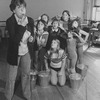 Actress Dorothy Loudon blowing a whistle as she is surrounded by orphan girls incl. Andrea McArdle (2L) as Little Orphan Annie during a rehearsal for the Broadway production of the musical "Annie.".