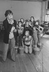 Actress Dorothy Loudon blowing a whistle as she is surrounded by orphan girls incl. Andrea McArdle (2L) as Little Orphan Annie during a rehearsal for the Broadway production of the musical "Annie.".