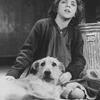 Actress Allison Smith as Little Orphan Annie with Sandy the dog in a scene from the Broadway production of the musical "Annie.".