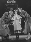 (L-R) Actors Reid Shelton as Daddy Warbucks, Andrea McArdle as Little Orphan Annie and Sandy Faison in a scene from the Broadway production of the musical "Annie.".