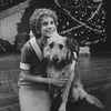 Actress Allison Smith as Little Orphan Annie with Sandy the dog in a scene from the Broadway production of the musical "Annie.".