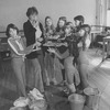 Actress Dorothy Loudon blowing a whistle as she is surrounded by orphan girls incl. Andrea McArdle (L) as Little Orphan Annie during a rehearsal for the Broadway production of the musical "Annie.".