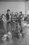 Actress Dorothy Loudon blowing a whistle as she is surrounded by orphan girls incl. Andrea McArdle (L) as Little Orphan Annie during a rehearsal for the Broadway production of the musical "Annie.".