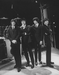 Unidentified Actors Impersonating Beatles L R John Lennon Paul Mccartney George Harrison And Ringo Starr In A Scene From The Broadway Production Of The Show Beatlemania Nypl Digital Collections