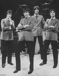 Unidentified actors impersonating Beatles Paul McCartney, Ringo Starr, George Harrison and John Lennon in a scene from the Broadway production of the show "Beatlemania."