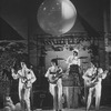 Mitch Weissman as Paul McCartney, Leslie Fradkin as George Harrison, Justin McNeill as Ringo Starr, and Joe Pecorino as John Lennon in a scene from the Broadway stage production Beatlemania