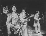 Unidentified actors impersonating Beatles (L-R) Ringo Starr, Paul McCartney, George Harrison, and John Lennon in a scene from the Broadway production of the show "Beatlemania."