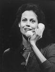 Actress Sigourney Weaver speaking on the phone in a scene from the Phoenix Theatre production of the play "Beyond Therapy.".