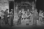 Actors Daniel Jenkins (as Huck Finn) (2L), Bob Gunton (C) and Rene Auberjonois (6R) in a scene from the Broadway production of the musical "Big River"