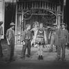 Actors Daniel Jenkins (as Huck Finn) (2L), Bob Gunton (C) and Rene Auberjonois (6R) in a scene from the Broadway production of the musical "Big River"