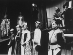 Actors Maya Angelou (5L) and Raymond St. Jacques (4R) with others in a scene from the Off-Broadway production of the play "The Blacks."