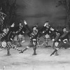 Ice skater John Curry (C) and dancers in a scene from the Broadway revival of the musical "Brigadoon"